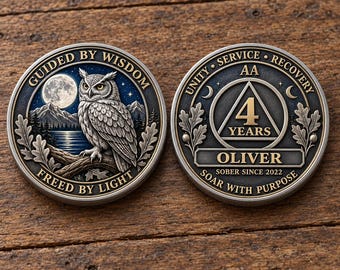 May include: Two circular metal coins with antique silver finishes. The left coin features an owl, a full moon, mountains, and the text GUIDED BY WISDOM and FREED BY LIGHT. The right coin displays a triangle, the text AA 4 YEARS, OLIVER, SOBER SINCE 2022, UNITY SERVICE RECOVERY, and SOAR WITH PURPOSE.