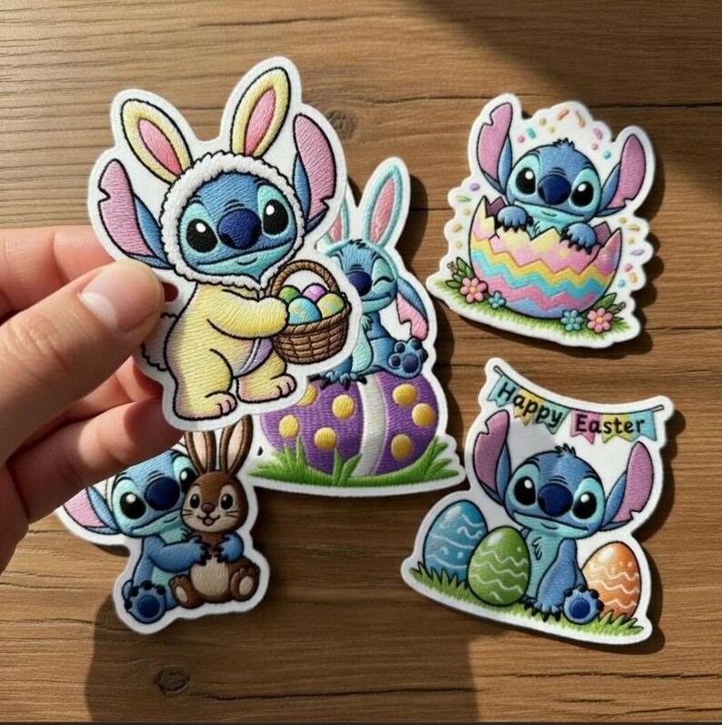 May include: A collection of embroidered patches featuring the character Stitch from Lilo & Stitch. The patches depict Stitch in Easter-themed designs, including bunny costumes, Easter eggs, and the text "Happy Easter".
