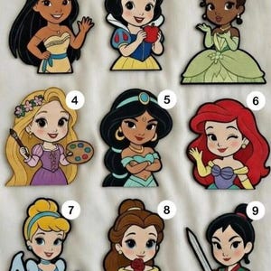 May include: Nine colorful cartoon character stickers featuring princesses. Each sticker has a unique design, including Pocahontas, Snow White, Tiana, Rapunzel, Jasmine, Ariel, Cinderella, Belle, and Mulan. The stickers are outlined in black.