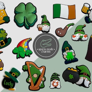 Puede incluir: Una colección de dijes con temática del Día de San Patricio. Incluye un trébol verde, la bandera irlandesa, duendes, jarras de cerveza, una olla de oro, un arcoíris, un arpa y una pipa. Los dijes son de varios colores, incluyendo verde, dorado y marrón.
