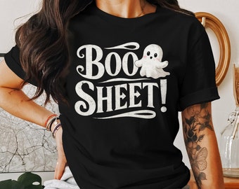 May include: Black t-shirt with a white ghost graphic and the text "Boo Sheet!" in a white vintage font.