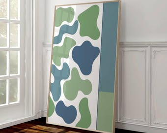 May include: Abstract art print with a white background and green and blue organic shapes. The print is framed in a light wood frame.