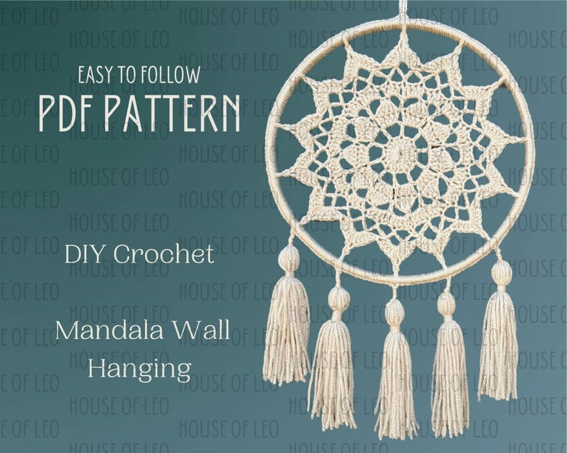 May include: A crochet mandala wall hanging with a beige color and a circular shape. The mandala has a starburst design with a fringe border. The hanging has five tassels at the bottom.