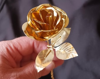 Hand forged brass rose with brass leaves