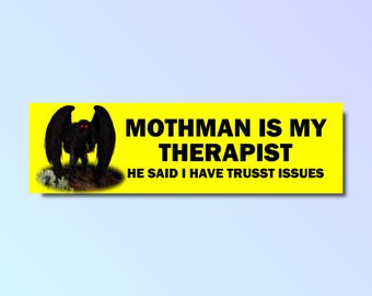 May include: Yellow bumper sticker featuring a black and white image of the Mothman, a cryptid with large wings and red eyes. The text reads "Mothman is my therapist. He said I have trust issues."
