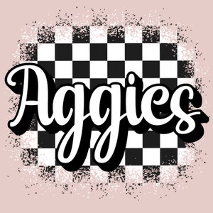 May include: White text that says "Aggies" in a stylised font, with a black outline. The text is over a black and white chequered background with a distressed effect.