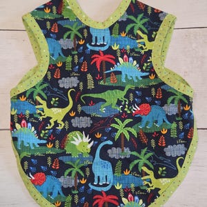 Baby bib, Bapron pattern, infant feeding cover, baby shower gift, handmade, 100 percent cotton, soft flannel back, dinosaurs