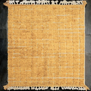 yellow wool rug, handwoven moroccan rug, textured area rug, boho home decor, cozy wool carpet, grid pattern rug, bohemian living room, mustard yellow rug, handmade bedroom rug, warm floor accent, boho wool carpet, minimalist area rug plush cozy decor