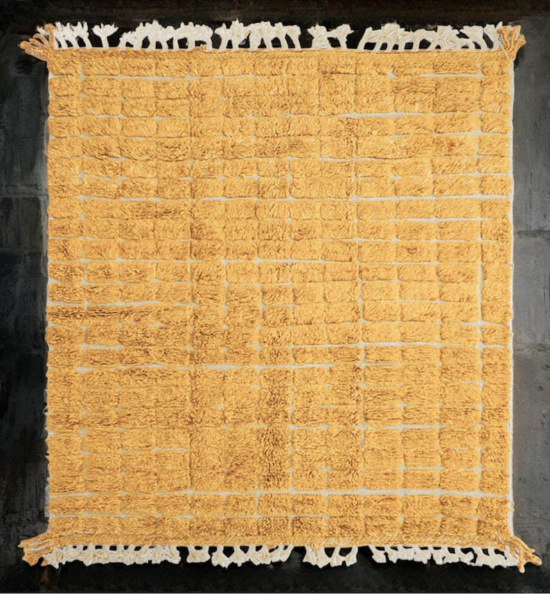 yellow wool rug, handwoven moroccan rug, textured area rug, boho home decor, cozy wool carpet, grid pattern rug, bohemian living room, mustard yellow rug, handmade bedroom rug, warm floor accent, boho wool carpet, minimalist area rug plush cozy decor