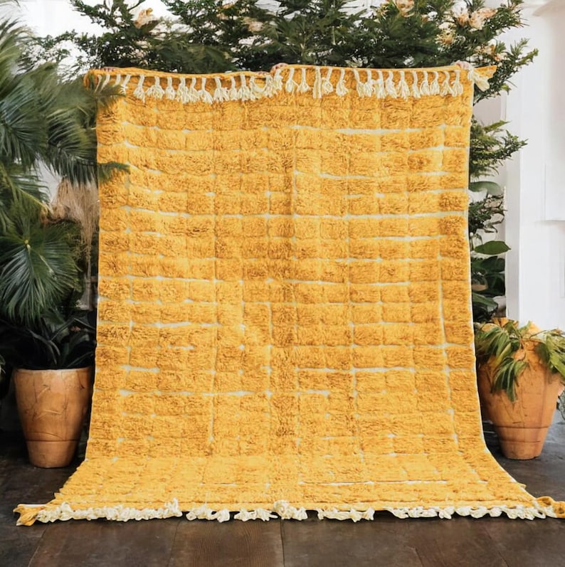 yellow wool rug, handwoven moroccan rug, textured area rug, boho home decor, cozy wool carpet, grid pattern rug, bohemian living room, mustard yellow rug, handmade bedroom rug, warm floor accent, boho wool carpet, minimalist area rug plush cozy decor