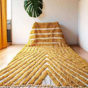 Yellow rug Handwoven rug Shaggy texture Moroccan style Geometric pattern Bohemian decor Cozy rug Soft texture Artisan rug Modern boho Statement piece Living room decor Bold design Striped rug Plush rug Warm tones Handmade rug Earthy colors Vintage