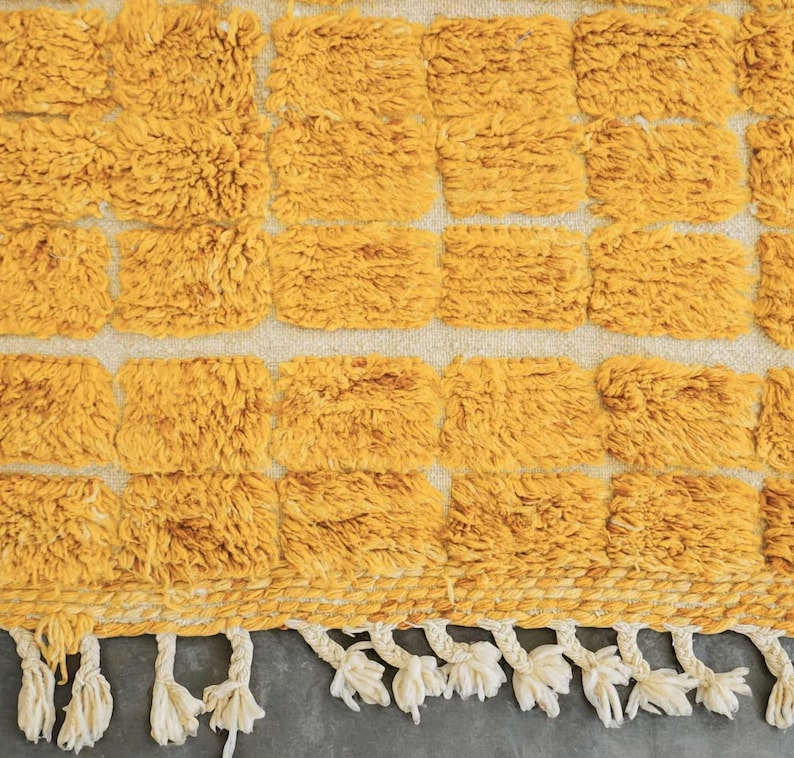 yellow wool rug, handwoven moroccan rug, textured area rug, boho home decor, cozy wool carpet, grid pattern rug, bohemian living room, mustard yellow rug, handmade bedroom rug, warm floor accent, boho wool carpet, minimalist area rug plush cozy decor