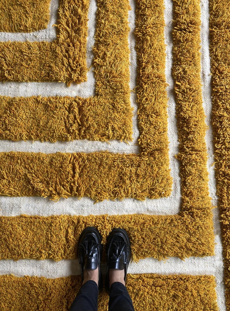 Yellow rug Handwoven rug Shaggy texture Moroccan style Geometric pattern Bohemian decor Cozy rug Soft texture Artisan rug Modern boho Statement piece Living room decor Bold design Striped rug Plush rug Warm tones Handmade rug Earthy colors Vintage