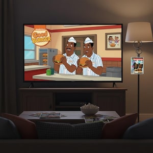 May include: A television screen displays a cartoon scene from "Good Burger" featuring two characters holding burgers. The scene is set in a diner with the show's logo. A lamp with a decorative image hangs nearby.