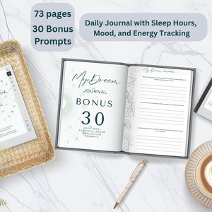 Könnte beinhalten: Ein digitales Traumtagebuch auf einem Tablet und einem aufgeschlagenen Buch mit 73 Seiten und 30 Bonus-Prompts. Der Text lautet My Dream Journal, Daily Journal with Sleep Hours, Mood, and Energy Tracking sowie Bonus 30 Additional Powerful Dream Evaluation Prompts.