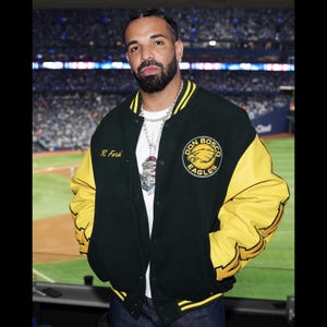 May include: A dark green and yellow varsity jacket with the text "DON BOSCO EAGLES" and "R. Ford". The jacket has yellow sleeves and a white t-shirt underneath.
