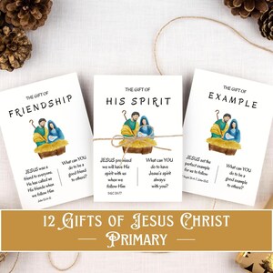 Könnte beinhalten: Drei weiße Karten mit Illustrationen der Geburt Christi, mit Bindfaden gebunden. Jede Karte trägt die Aufschriften: "Das Geschenk der Freundschaft", "Sein Geist" und "Beispiel". Ein Banner unten lautet "12 Geschenke Jesu Christi Primar".