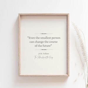 May include: A framed print featuring a quote from J.R.R. Tolkien's "The Fellowship of the Ring": "Even the smallest person can change the course of the future."