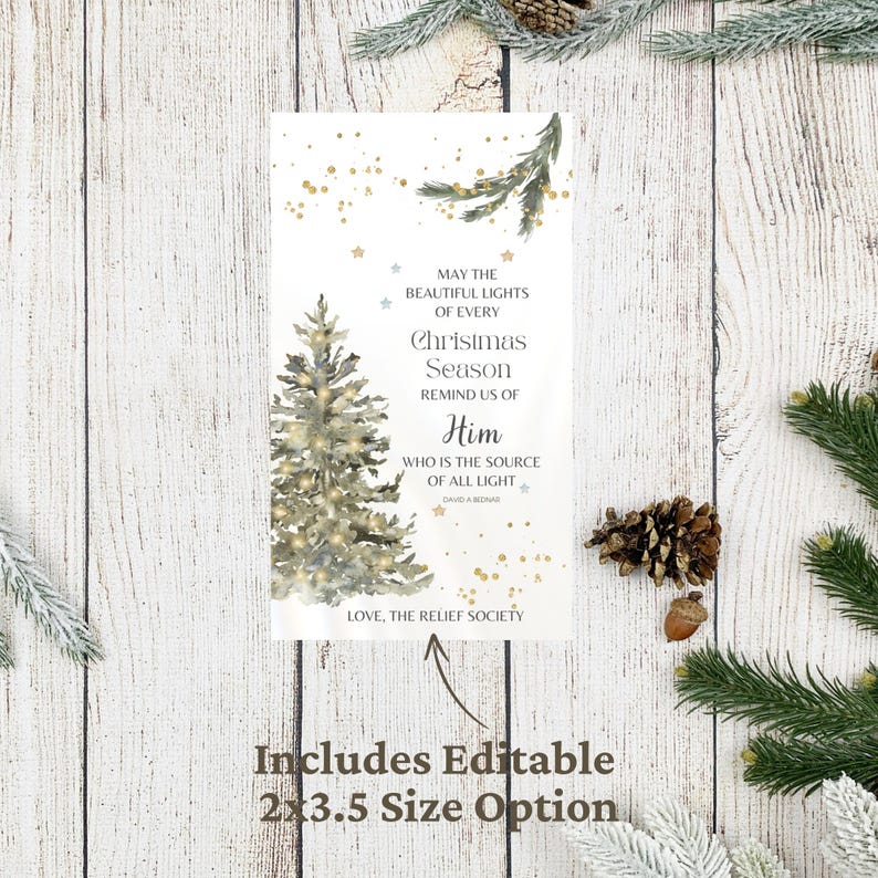May include: A Christmas card with a watercolor illustration of a decorated Christmas tree. The card features text that reads "May the beautiful lights of every Christmas Season remind us of Him." The card is 5.08 x 8.89 cm.