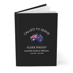 May include: Black journal with the text "Called to Serve" in a white circle around a map of Australia with the Australian flag. The text "Elder Wright" is below the map, followed by "Australia Sydney Mission" and "April 2024 - April 2026".