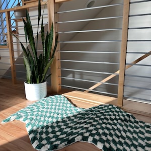 Our checkered rug in basil green!