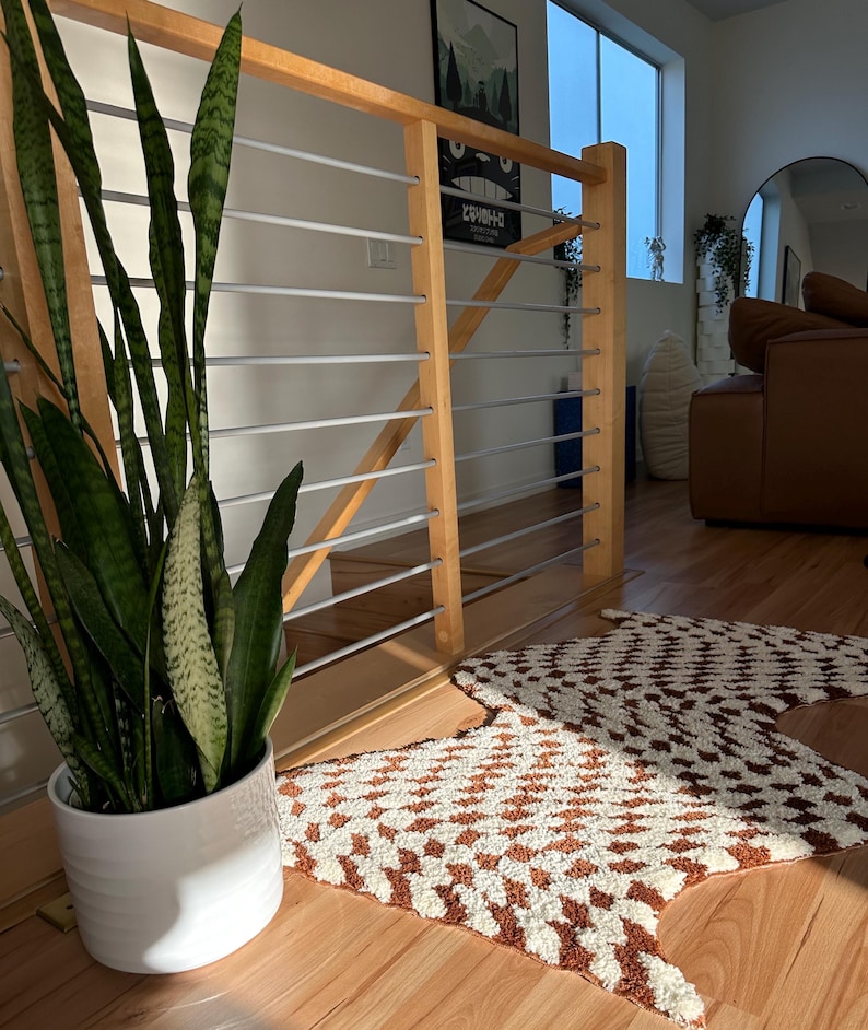 Our checkered rug in coffee & cream!