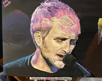 May include: A painting of a person with pink and purple hair singing into a microphone. The painting is on a canvas and is propped up on an easel. The artist's signature, "Kitty Smalis", is in the bottom left corner.