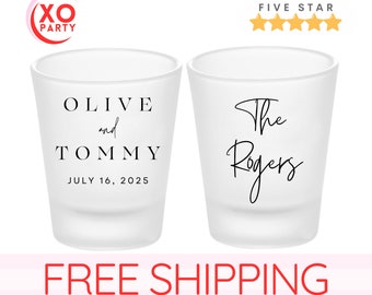 May include: Two white shot glasses with black text. The first glass says "Olive and Tommy July 16, 2025". The second glass says "The Rogers".