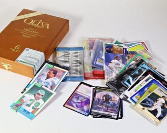 Cigar Box full of collectible Pokemon, NFL, Baseball, NBA, Magic & other trading cards.