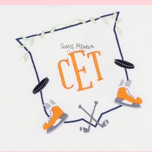 May include: Embroidered hockey crest design with orange initials "CET" inside a navy blue frame. The design includes hockey skates, pucks, and crossed hockey sticks, with the text "HOCKEY CREST" at the top.