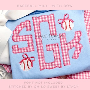 May include: Light blue shirt with a pink and white gingham monogram design. The monogram includes the letters SGH, with baseball and bow accents. The text "Sweet Petunia Stitches" is also visible.