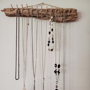 Seven chain necklaces Vintage included one with shell beads metal circles,white beads and chain, add own charms review the video and photos,