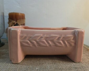 Ceramic room decor piece, perfect for display or use as a planter. This coral-inspired collectible features “USA” marked on the bottom.