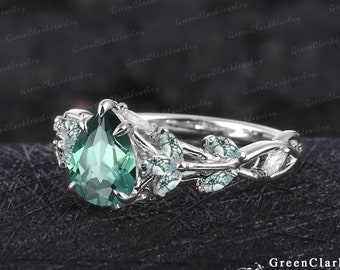 Unique pear shaped green sapphire engagement ring Art deco gemstone promise ring Nature inspired solid 14k white gold leaf ring Jewelry gift