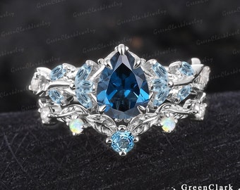 Unique pear shaped London blue topaz engagement ring sets Art deco leaf promise ring Nature inspired 14k white gold bridal sets Jewelry gift