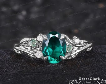 Unique oval cut emerald engagement ring Art deco promise ring Nature inspired solid 14k white gold green gemstone leaf ring Anniversary gift