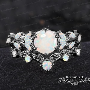 Gothic white opal engagement ring set Art deco black gold leaf promise ring Nature inspired October birthstone bridal set Women jewelry gift