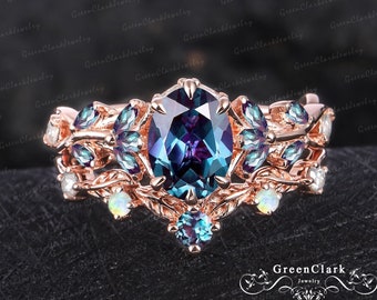 Unique oval cut alexandrite engagement ring sets Art deco leaf promise ring Nature inspired 14k rose gold bridal sets Jewelry gifts for her