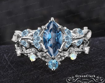 Unique marquise cut London blue topaz engagement ring set Art deco leaf promise ring Nature inspired 14k white gold bridal sets Jewelry gift