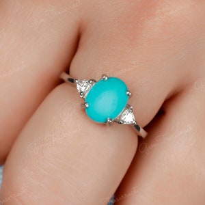 Sleeping Beauty Turquoise Engagement Ring: Oval Trilogy Moissanite, October Birthstone