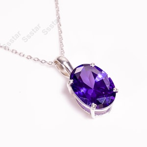Oval Blue Sapphire Sterling Silver Pendant - September Birthstone