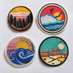 Parche termoadhesivo "Atardecer con aves y mar", "Haz más desvíos", "Sol del desierto", "Ola azul"