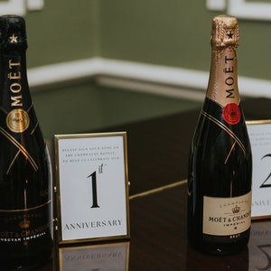 Champagne anniversary bottle wedding guestbook