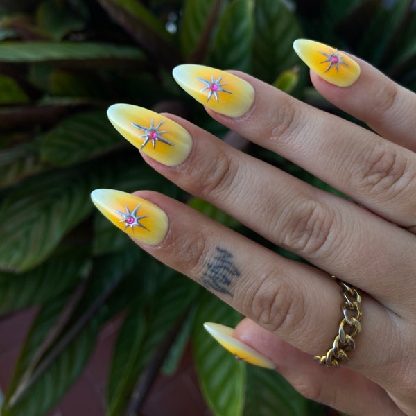 Orange aura press on nails | leo season inspired nails | press on nails | airbrush nails | almond nails | fake nails | summer nails