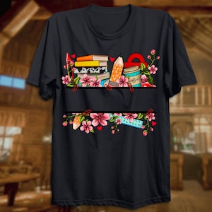 May include: Black t-shirt with a graphic of a shelf with books, pencils, a ruler, a coffee cup, and flowers. The text "Coffee & Books" is on the coffee cup.