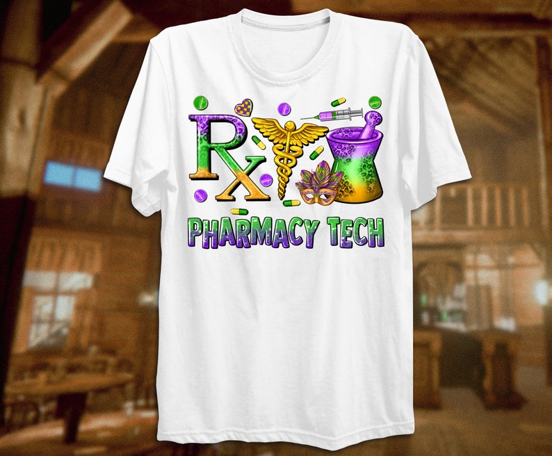 May include: White t-shirt featuring a colorful design with the text "Rx PHARMACY TECH". The design includes a caduceus, mortar and pestle, pills, and a Mardi Gras mask. The letters "Rx" are in purple and green.