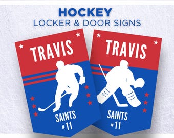 May include: Two hockey locker and door signs with a red and blue color scheme. Each sign features the name "TRAVIS" in white, a white hockey player silhouette, and the text "SAINTS #11". The signs also have stars.