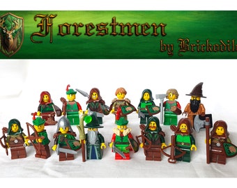 May include: A group of 14 green and brown Lego minifigures, some with weapons and shields, representing forestmen. The figures are arranged in two rows on a white surface. The title "Forestmen by Brickodile" is displayed above the figures on a green background.