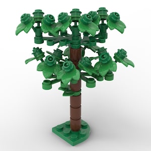 Peut inclure: Un petit arbre composé de blocs de construction verts et bruns. L'arbre a un tronc brun, une base verte et plusieurs branches avec des feuilles vertes. Les feuilles sont d'une nuance de vert plus claire.