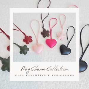 Dije colgante de cuero con forma de corazón y flor para bolso, bonito accesorio con correa, etiqueta estética para bolso, llavero con dije de corazón de cuero sintético.